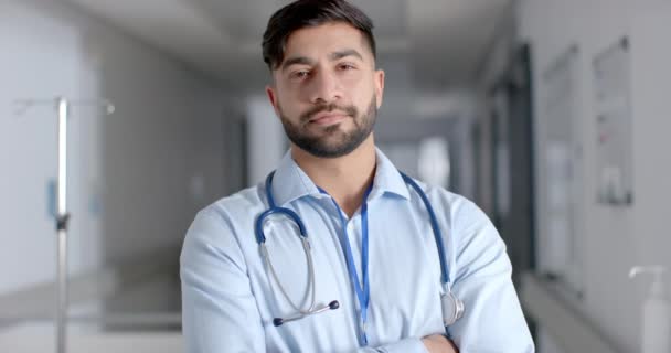 Young Asian Doctor Medical Attire Stands Confidently Hospital His Smile — Stock Video