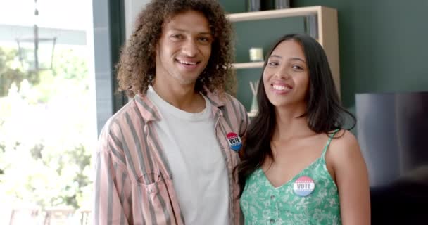 Biracial Couple Home Wearing Voted Stickers Highlight Civic Engagement Slow — Stock video