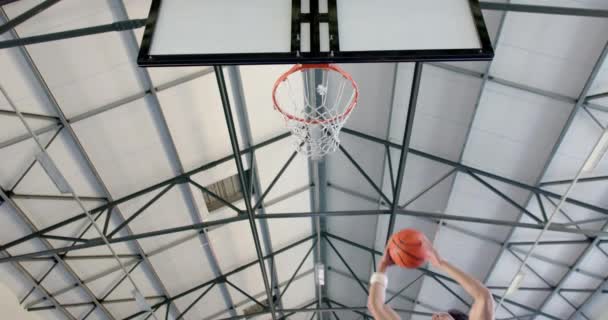 African American Basketball Player Scores Basket Dynamic Angle Captures Excitement — Stock Video