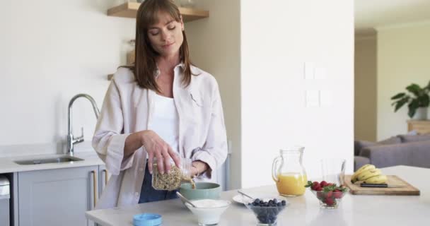 Middle Aged Caucasian Woman Prepares Breakfast Home Kitchen She Focused — Stock Video