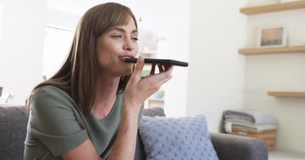 Middle Aged Caucasian Woman Records Voice Message Home Copy Space — Stock Video