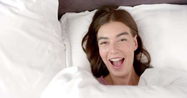 Teenage Caucasian Girl Brown Hair Laughing While Lying Bed Home — Stock Video
