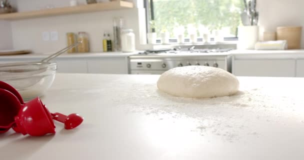 Dough Ball Floured Kitchen Counter Measuring Cups Scattered Nearby Hinting — Stock Video