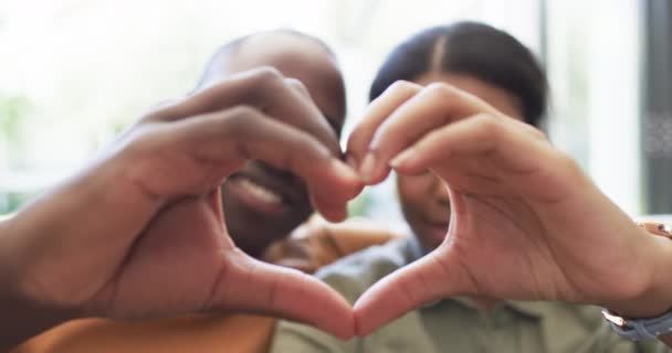 Diverse Couple Forms Heart Shape Hands Husband Has Beard Wife — Stock Video