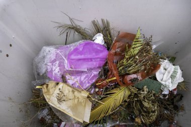 Detail of garbage and remains in an old cemetery