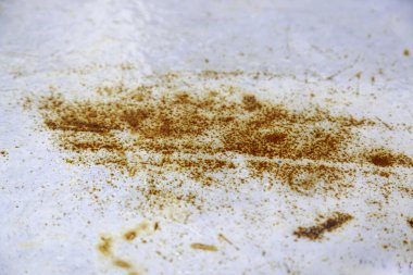 Detail of old metal wall damaged and rusty by the passage of time