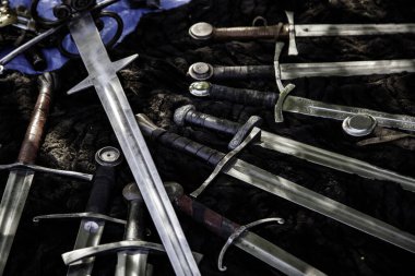 Detail of ancient medieval weapons, war and crime