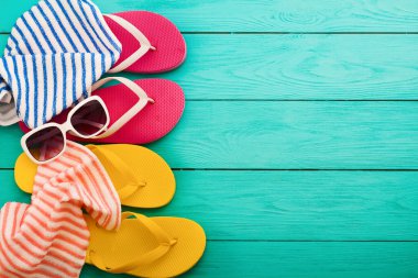 summer bavkground top view close up, summer accesories on wooden background