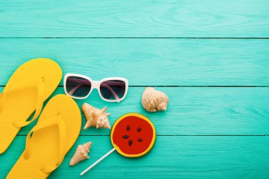 summer bavkground top view close up, summer accesories on wooden background