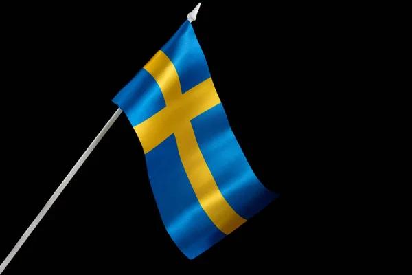Sweden flag waving. The flag of Sweden on a black background is developing and flying in the wind