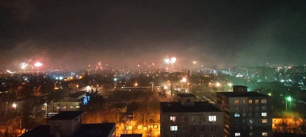 New Year\'s fireworks over the city from a bird\'s eye view