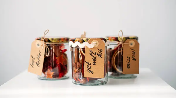 Gift in jar ideas. Get Well Soon Gifts kit with vitamins, nuts, spices, dry oranges, Cinnamon Sticks in jars. Care package, gift box for a sick friend. Feel Better Gifts, Thinking of You Gift kit.