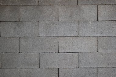 Beton ya da beton tuğla duvar. Ayrıntılı çekim, insan yok..