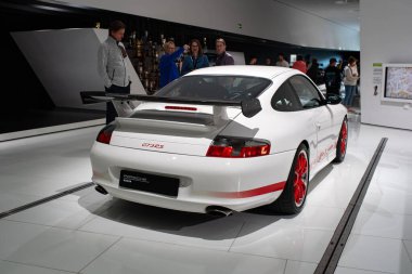 14-09-2024, Stuttgart, Germany. Porsche Museum.14-09-2024, Stuttgart, Germany. Type 996 Porsche 911 GT3 RS in white. clipart