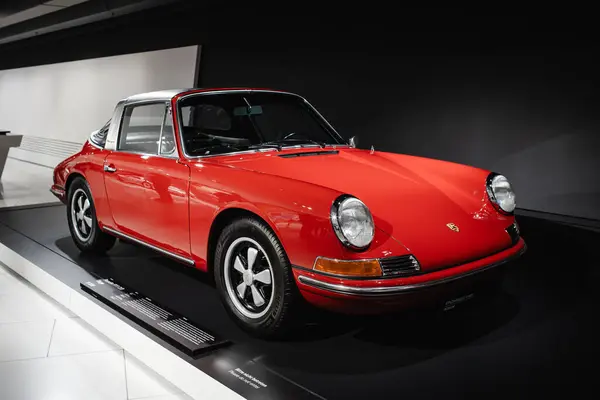 stock image 14-09-2024, Stuttgart, Germany. Porsche museum exhibition hall. Red targa top, type 930 911 on display.