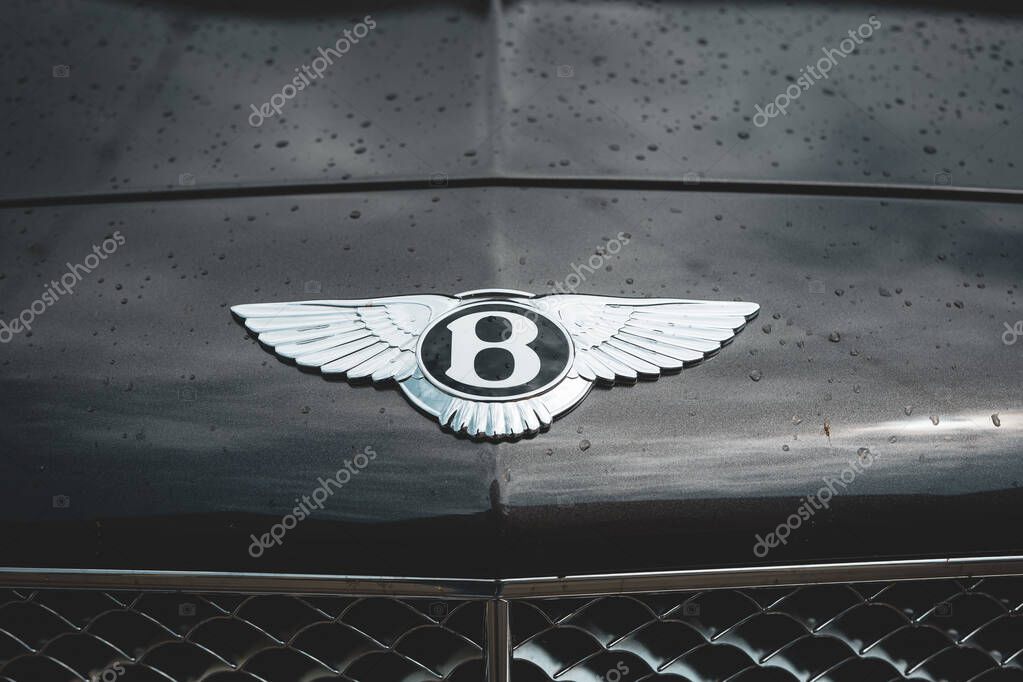 08-06-2025, Kempttal, Switzerland. Bentley hood or bonnet ornament emblem or badge. Top down, close up detail shot, no people