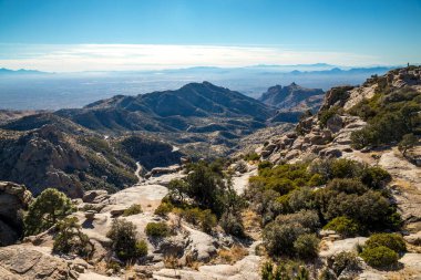 Hikers traverse rugged trails in Coronado National Forest, embracing the beauty of Mount Lemmon and its majestic landscape. clipart