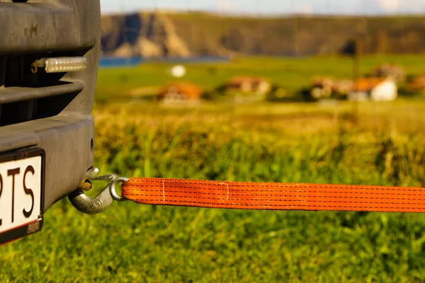 Tow Hook with Orange Strap on Car. Towing Equipment Stock Image