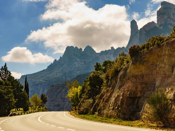 stock image Asphalt road winding through the mountains of Montserrat, rocky landscape, Catalonia Spain.