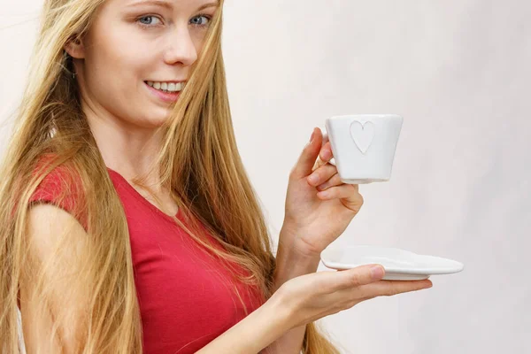 Blonde Girl Blowing Long Hair Holds Heart Shaped Coffee Cup — Stock Photo, Image