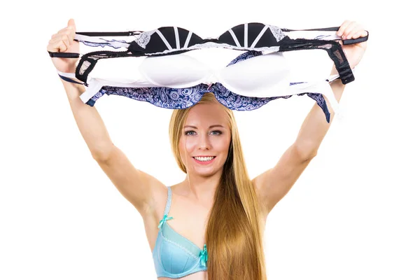 Blonde Young Woman Wearing Underwear Holding Many Bras Hand Choosing — Stock Photo, Image