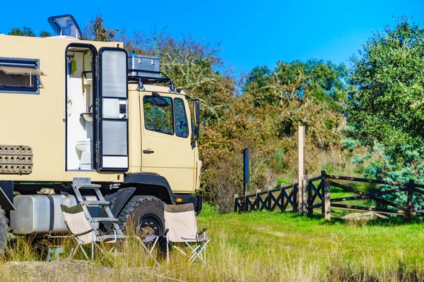 Lorry camper, house truck camping on nature. Travel with motorhome.