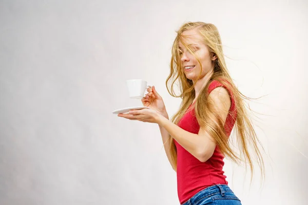 Blonde Girl Blowing Long Hair Holds Heart Shaped Coffee Cup — Stock Photo, Image