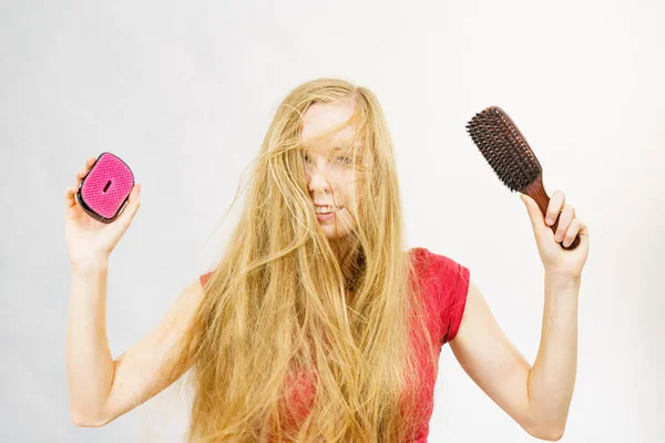 Blonde Girl Long Blowing Hair Holds Two Brushes One Natural — Stock Photo, Image