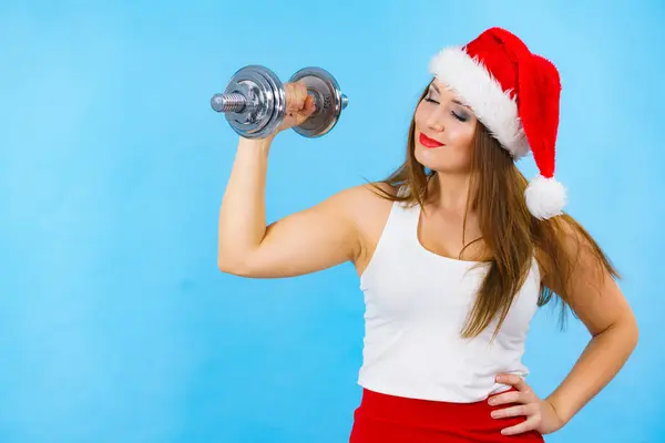 Silvester Fitness Und Muskelaufbau Auflösung Frau Mit Weihnachtsmann Hut Die — Stockfoto