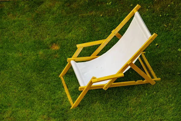 Deck deck chair for rest in garden. View from above