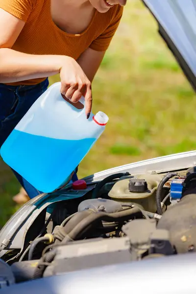 Woman Pouring Blue Antifreeze Liquid Car Windshield Screen Washing Bootle — Stock Photo, Image