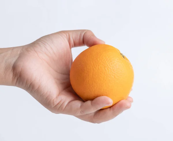 Hand Holding Fresh Orange White Backgrounds — Stock Photo, Image