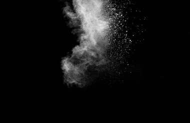 Beyaz toz bulutu havada süzülüyor.