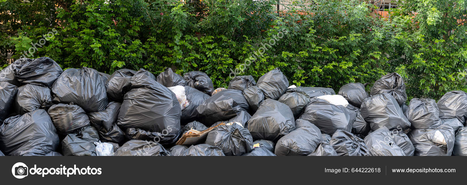 Background garbage bag black bin waste, Garbage dump, Bin,Trash, Garbage,  Rubbish, Plastic Bags pile junk garbage Trash texture, Background waste  plastic bin bag. Stock Photo