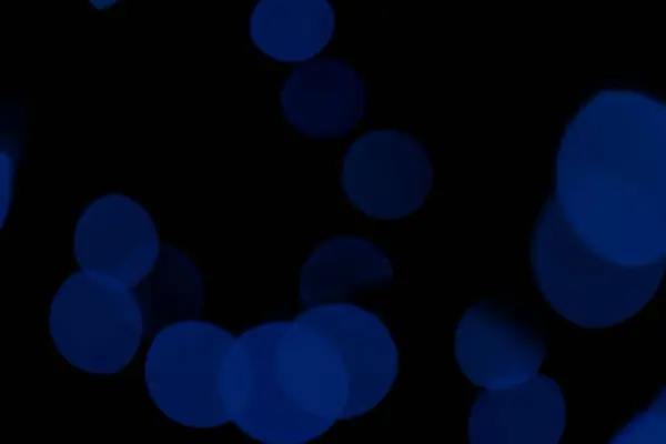 ダークブルーの粒子ナイトアワード背景 アブストラクトブルー粒子グリッターラグジュアリー ダークブルーを背景にした抽象的なボケ 休日のコンセプト — ストック写真