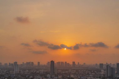 PM 2.5 dust in Bangkok,Capital city are covered by heavy smog,Sunset in downtown with bad air pollution, the Place to risk of cancer, environmental problem