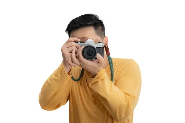 Dslr Kamerasını Beyaza Çeviren Yakışıklı Genç Adam Beyaz Izole Edilmiş — Stok fotoğraf