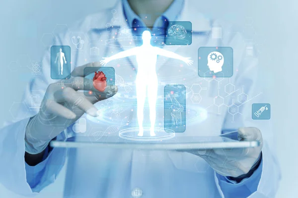 Concept electronic medical technology on tablet Digital healthcare body system analysis and networking on a holographic interface. science and innovation medical technology and network concept