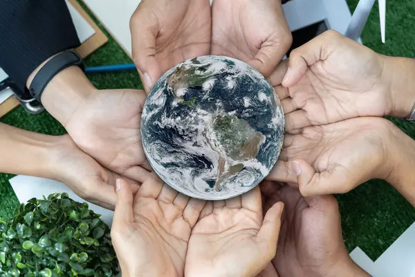 World Environment Day. Corporate social responsibility CSR. business hands holding Earth together for the Sustainable Development Goals. Responsibility for the environment. Save and protect the world.