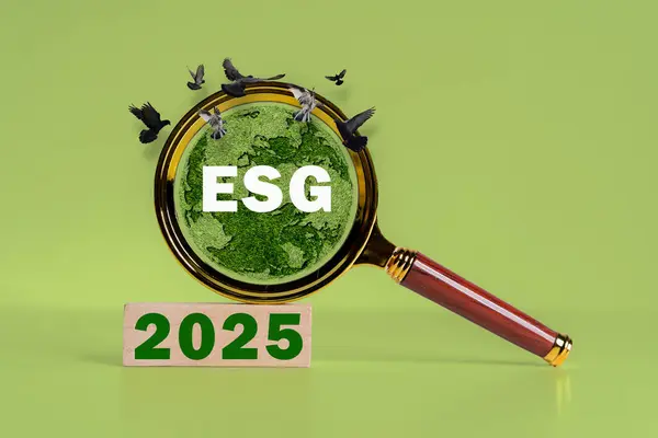 stock image ESG goals by 2025 concept. Sustainable corporation development. Wooden blocks symbolize ESG, Environmental Social Governance with a calendar marking 2025.