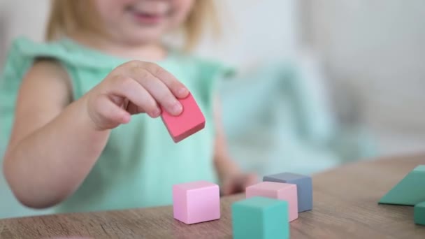 Unrecognizable Little Girl Playing Colorful Wooden Cubes Focus Cubes — Video