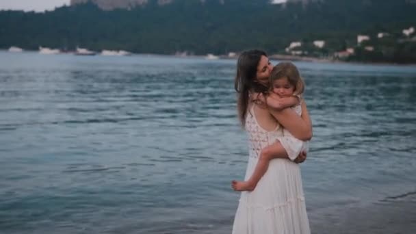 Loving Mother Holding Her Years Old Daughter While Walking Sea — Stock Video
