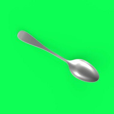 green plastic spoon on a blue background