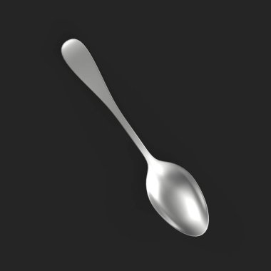 empty black plastic spoon on a dark background
