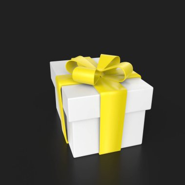 gift box with yellow ribbon on black background