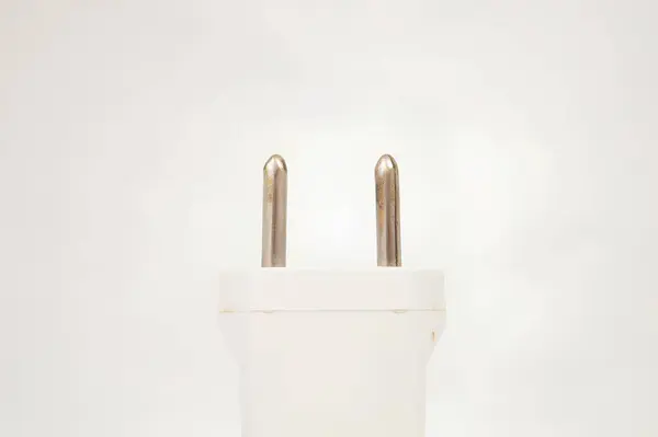 Close-Up of a White Power Plug. High quality photo