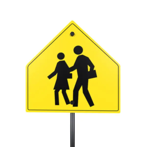 stock image A yellow triangular sign shows two pedestrians walking, indicating a school zone crossing.