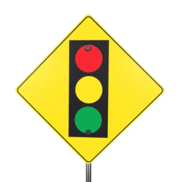 stock image A caution sign featuring a traffic light symbol with red, yellow, and green circles.