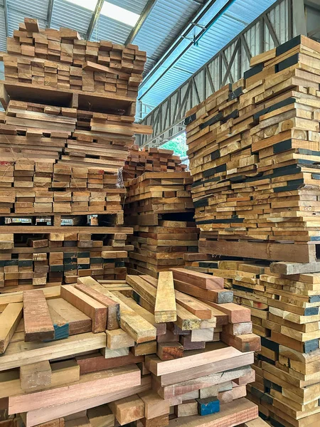 Woods stack in the sawmill.  Pile of woods on shelves in factory