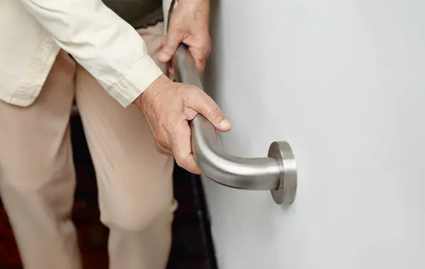 stock image Elderly Woman Holding Handrail for Support
